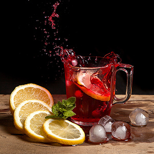 Hibiscus cold tea with ice, lemon and mint